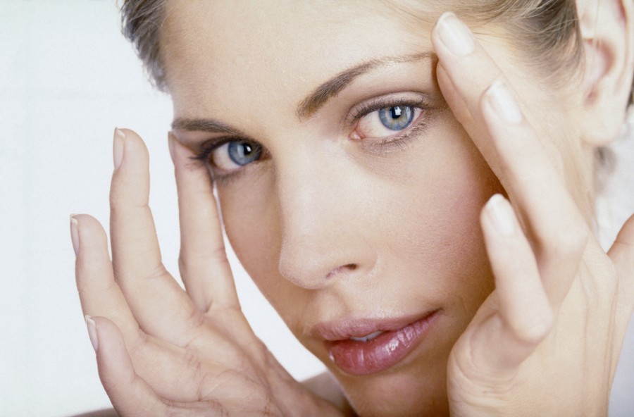 Viso più giovane con il Qi gong