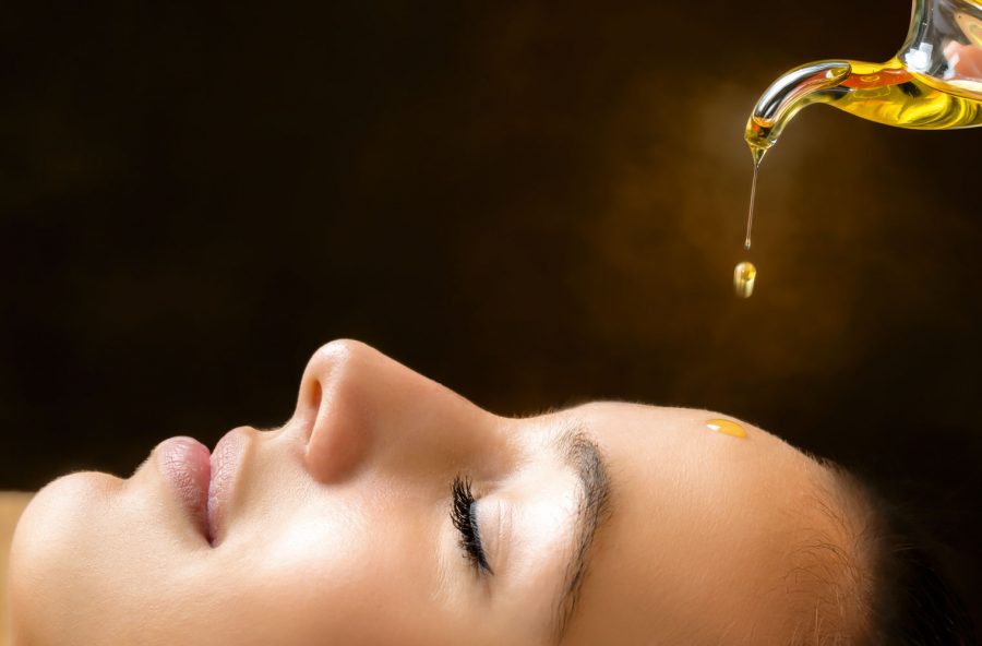 Massaggio effetto tone-up con oli essenziali