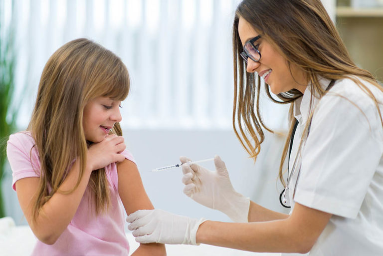 Brave kid having injection