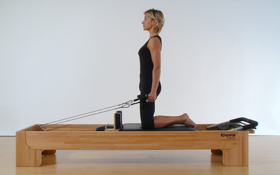 Pilates, chest expansion sul Reformer per una postura elegante