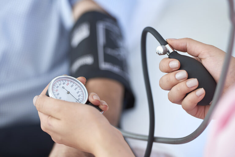 Nurse measuring blood pressure. Nurse measuring blood pressure.