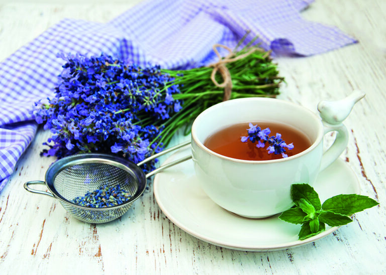Cup of tea and lavender flowers on a old wooden background; Shutterstock ID 425538316 Cup of tea and lavender flowers on a old wooden background; Shutterstock ID 425538316