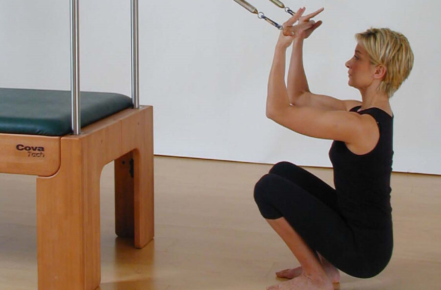 Pilates, total body workout con gli Squat sulla Cadillac