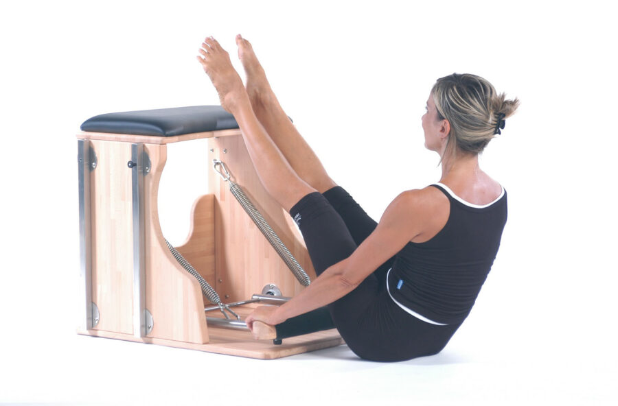 Pilates: modella gli addominali con il Press down teaser sulla Chair