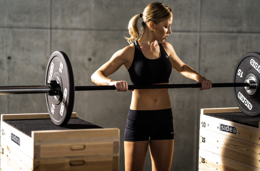 Glutei tonici e modellati con il bilanciere