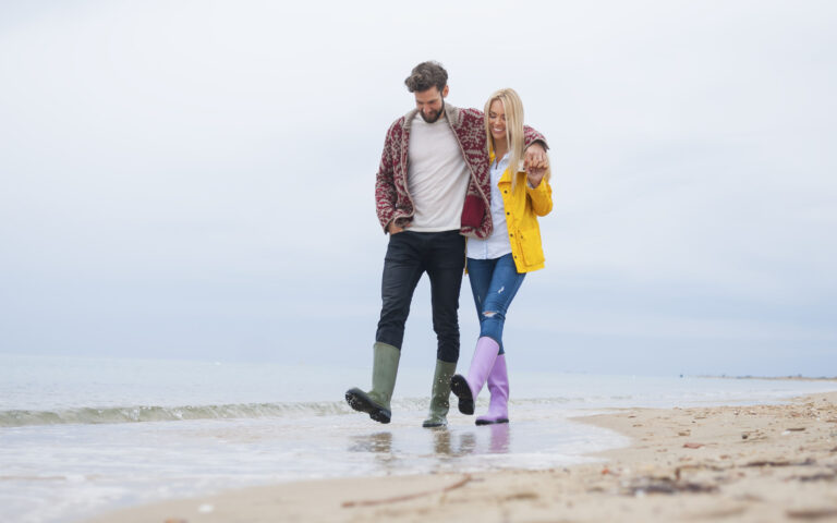 Couple walking on beach