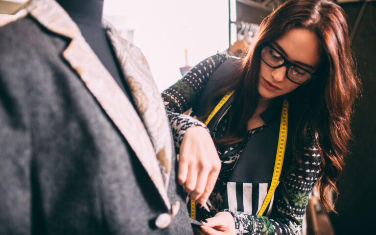 A portrait of a designer in a store