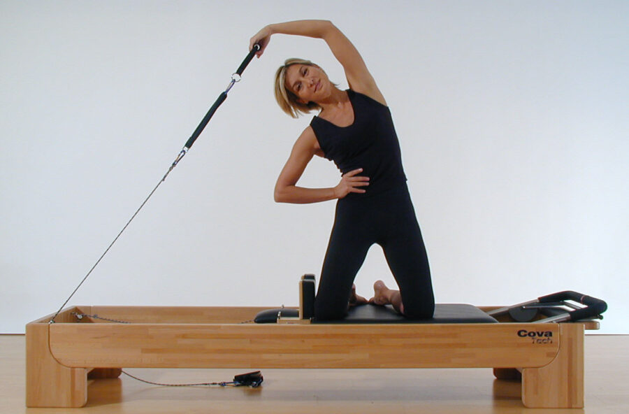 Pilates: rassoda il punto vita sul Reformer e a corpo libero