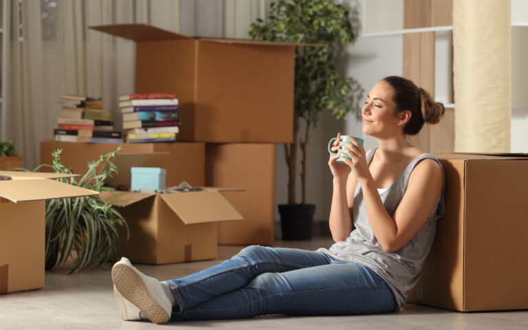 Happy tenant moving home resting breathing fresh air Happy tenant moving home resting breathing fresh air