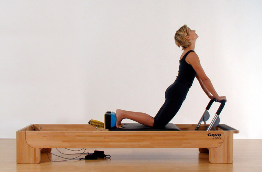 Pilates: fai il Pesciolino per modellare gli addominali. Sul Reformer e a corpo libero