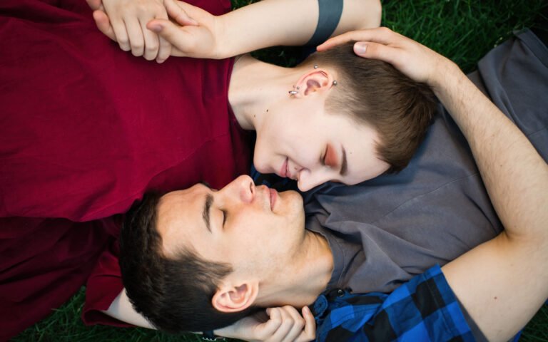 Happy boy and girl relaxing outdoors in summer. Happy boy and girl relaxing outdoors in summer.