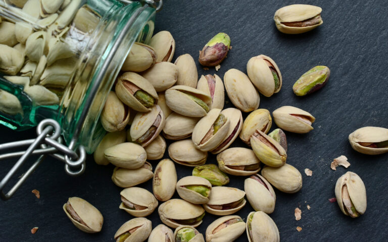 Pistachios on a dark background