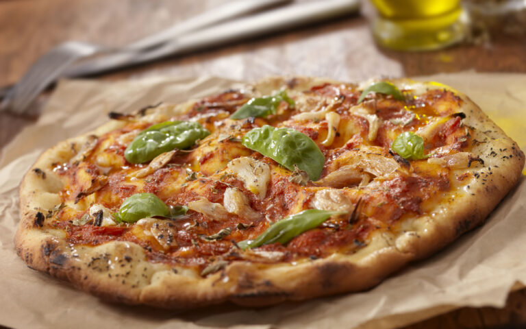 "Authentic Italian, Hand Made Marinara Pizza with Roasted Garlic, Marinara Sauce, Fresh Basil and Olive Oil- Photographed on a Hasselblad H3D11-39 megapixel Camera System" "Authentic Italian, Hand Made Marinara Pizza with Roasted Garlic, Marinara Sauce, Fresh Basil and Olive Oil- Photographed on a Hasselblad H3D11-39 megapixel Camera System"