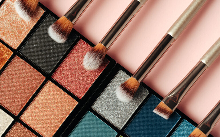 Make-up palette and brushes. Professional eyeshadow palette. Close up. Make-up palette and brushes. Professional eyeshadow palette. Close up.