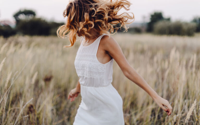 Young woman outdoor enjoying the sunset