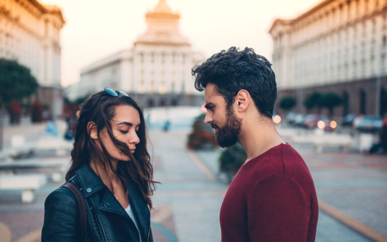 Man and woman arguing at the street Man and woman arguing at the street