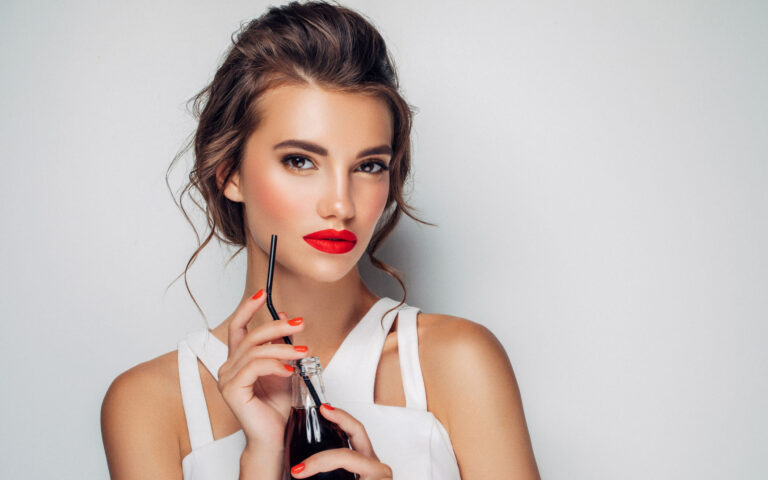 Woman drinking soda Woman drinking soda
