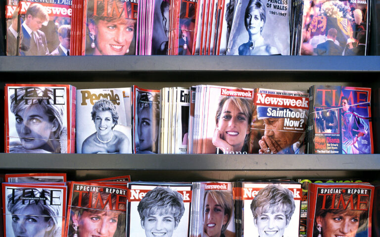 A68EF2 A magazine rack display featuring Princess Diana