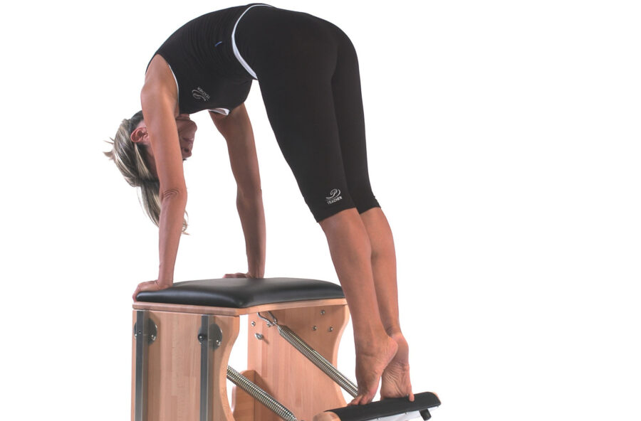 Pilates: scolpisci braccia, pettorali e dorsali con il Pull up sulla Chair