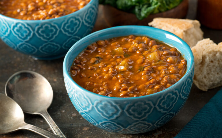 A bowl of delicious hearty homemade curried lentil soup. A bowl of delicious hearty homemade curried lentil soup.