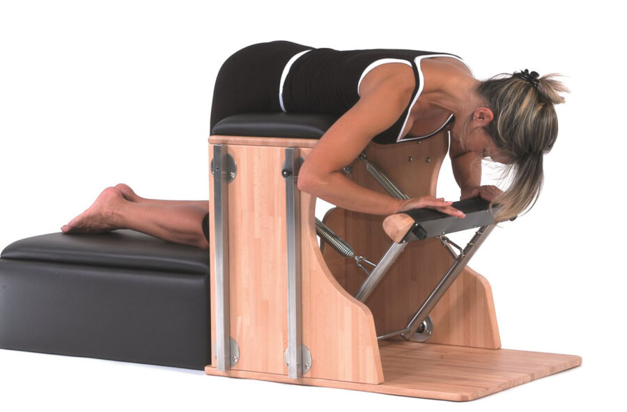 Pilates: braccia toniche e definite con il Pumping on knees sulla Chair