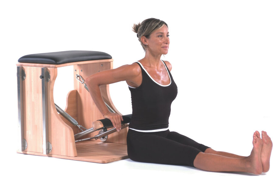 Pilates: tonifica braccia e pettorali sulla Chair